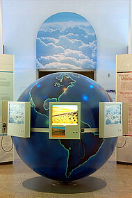 View of the globe in the centre of the exhibition